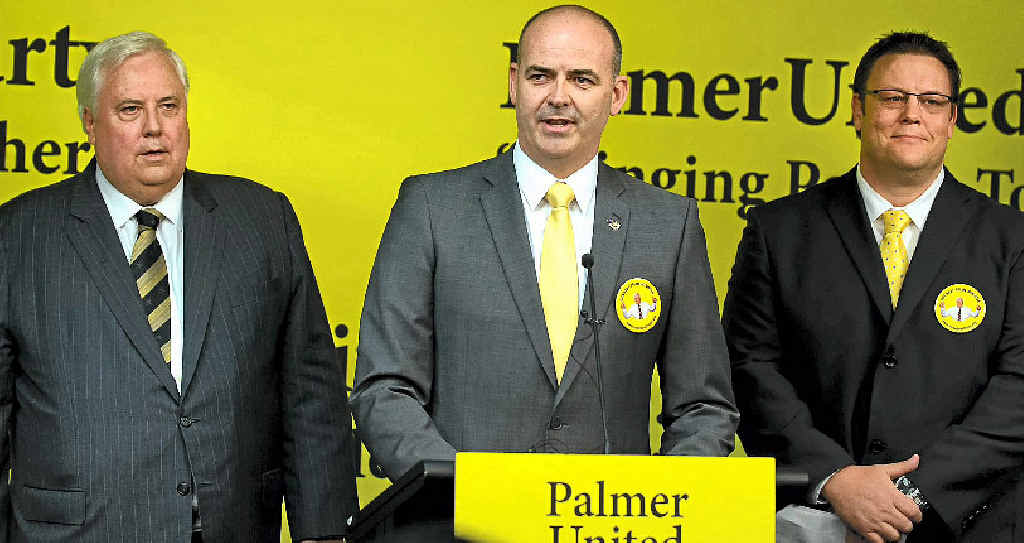 STATE FOCUS: Palmer United candidate for Blair Anthony Stanton (centre), flanked by Clive Palmer (left) and Glenn Lazarus (right). STATE FOCUS: Palmer United candidate for Blair Anthony Stanton (centre), flanked by Clive Palmer (left) and Glenn Lazarus (right).